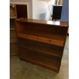 A Nathan teak two drawer bookcase. 102cm wide