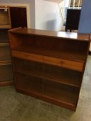 A Nathan teak two drawer bookcase. 102cm wide
