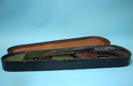 A violin, bow and coffin case