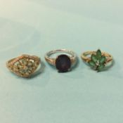 Three 9ct gold dress rings, 8.7g