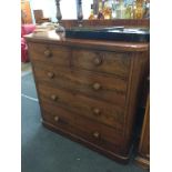 A Victorian mahogany chest of drawers, with two short and three long graduated drawers, supplied