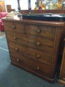 A Victorian mahogany chest of drawers, with two short and three long graduated drawers, supplied