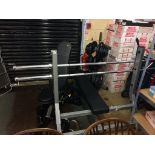 A Power Tec work bench, a collection of Body Power weights, with stand and a Body Solid bench