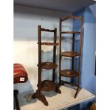 A carved cake stand and an oak cake stand