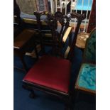 A reproduction mahogany single chair