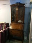 An oak bureau bookcase