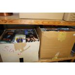 Two boxes of DVDs