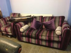 A purple and grey striped two seater bed settee, with matching armchair