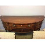 A reproduction mahogany demi-lune sideboard