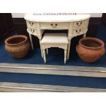 A large pair of terracotta circular planters. Approx. 50cm diameter