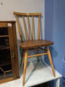 An Ercol stick back single chair