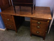 A large 1930's oak pedestal office desk. 152cm wide