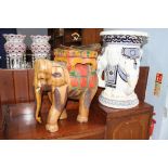 A pottery Elephant seat and a carved wood Elephant seat