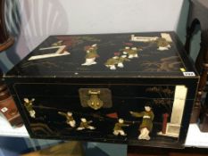 An Oriental style lacquered box