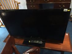 A Panasonic 40" television, with remote