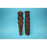 A pair of carved oak relief mouldings