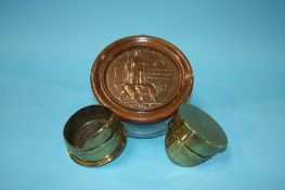 A mounted Death plaque, to Edward Miller and two brass Trench Art military hats