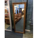 A gold coloured edged mirror