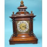 A walnut cased 8 day mantel clock