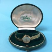 A ladies 9ct gold Rolex wristwatch, with fitted box