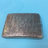 A heavily decorated Niello, silver coloured cigarette case, 128g