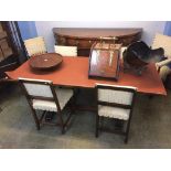 An oak refectory table and six chairs