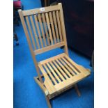 A set of four teak folding garden chairs (as new)