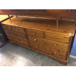 A long pine chest of drawers