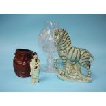 A carved Oriental brush set, a small Chinese pottery figure, a pottery Zebra etc.