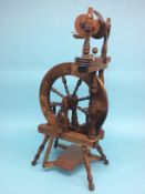 An Ashford Traveller Spinning Wheel, single treadle and an Ashford rigid heddle loom, 40cm, with