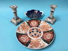 A pair of Italian Majolica candlesticks, an Imari plate and a Coalport dish (4)