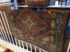 A machine made Persian style rug