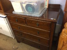 An oak chest of drawers