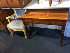 A mahogany side table and an Elbow chair