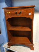 A small reproduction yew bookcase