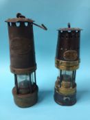 A Patterson Lamps Limited of Gateshead, type M. IG and a Thomas and Williams of Aberdare, type no. 4