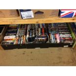 Three boxes of DVDs