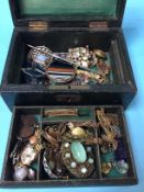 A leather jewellery box and contents