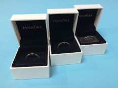 Three boxed Pandora rings