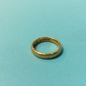 A 22ct wedding band, size L, 5.7 grams