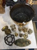 A brass jam pan and various brass weights