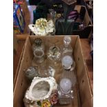 Box of assorted including a decanters, oil lamps etc.