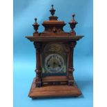 An Edwardian walnut cased 8 day mantel clock