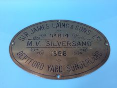 A brass oval wall plaque 'Sir James Laing and Sons Ltd, no 814., Deptford Yard, Sunderland', 43cm