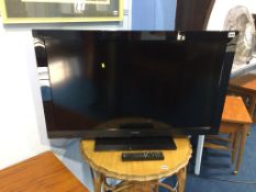 A Sony 40" TV, with remote (in office)