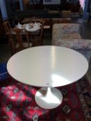 An Arkana Tulip dining table, 106cm diameter