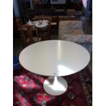 An Arkana Tulip dining table, 106cm diameter