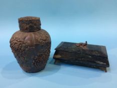 An Onyx box and an Oriental cast metal tea caddy