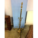 A brass telescopic standard lamp