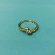 An 18ct gold diamond ring, 2.9 grams, size L